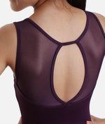 Close-up of a purple leotard with open back design. 